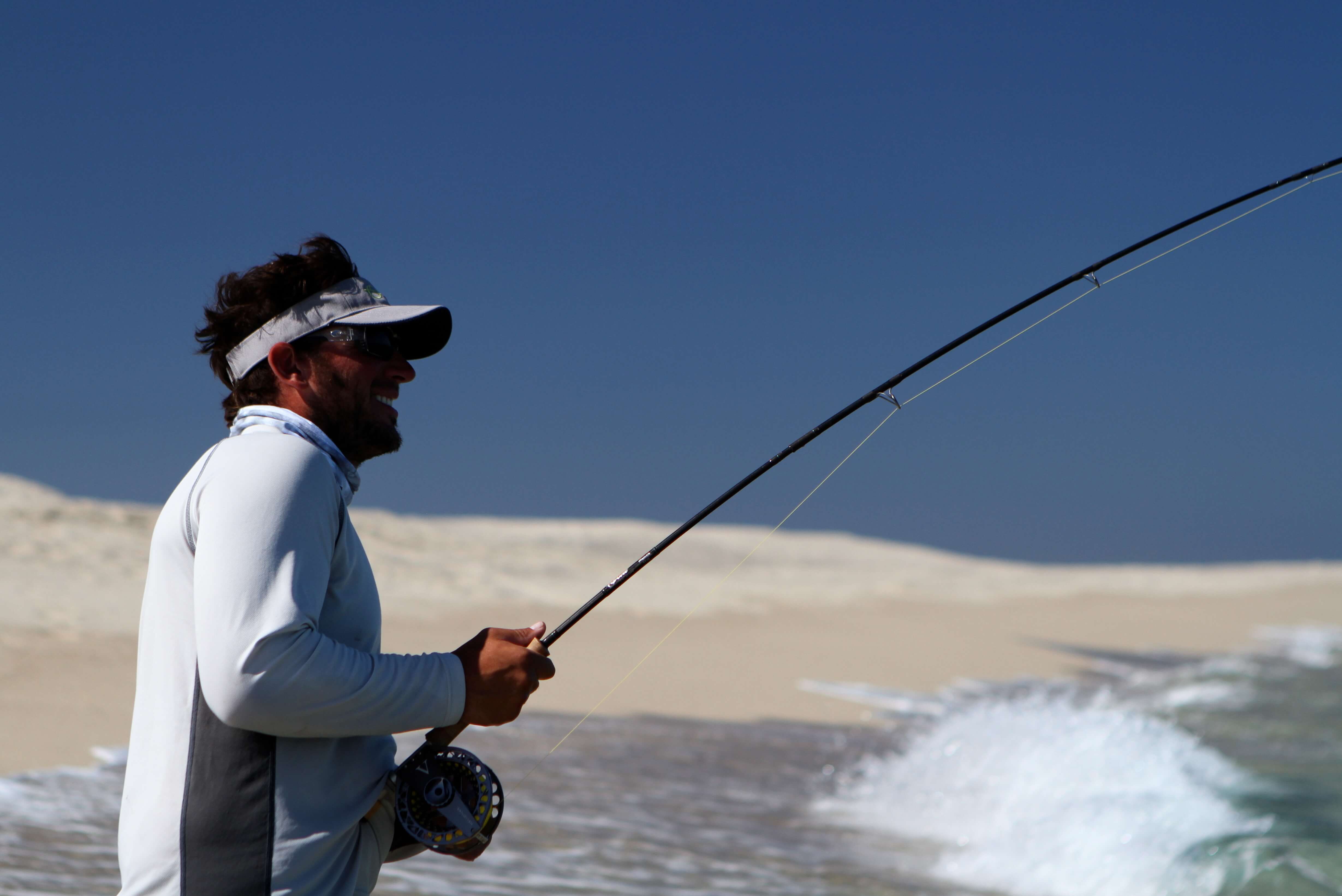 fighting-roosterfish-from-beach