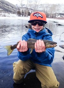 El;even Mile fishing boy with trout