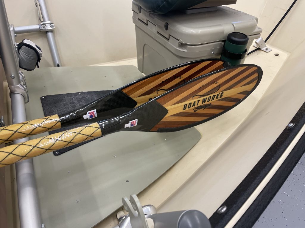 Float Fishing Guide Part 1 — The Boat, brown detailed float fishing oars on top of white counter